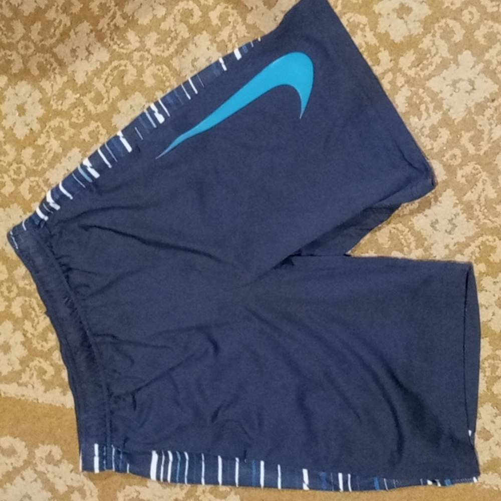 Nike women's Dri-Fit shorts. Navy with lighter blue swoosh